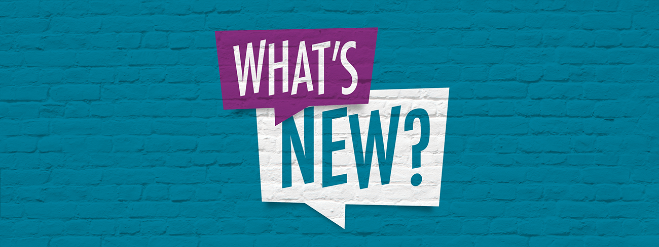 'What's New?' on blue brick background